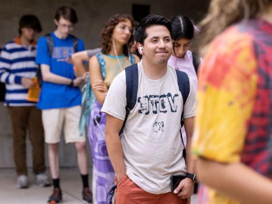 Ethan Tobias waiting in line to vote